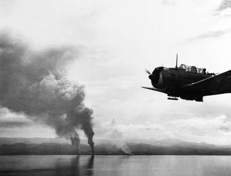 beached Japanese transports burning